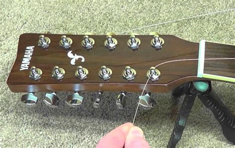 Image result for Stringing 12 String Guitar