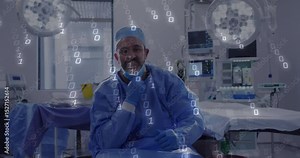Surgeon touching mask in operating suite and reacting to animated binary codes drifting overhead