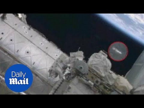 UFO spotted above astronaut as he repairs ISS - Daily Mail