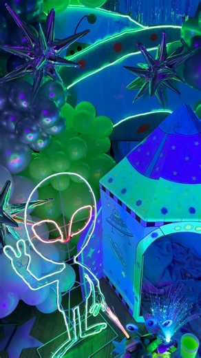 #otcpartner With the help of my friends over at Oriental Trading Company I was able to create this alien invasion sleepover. There’s no time to waste as we must color our rocket to blast off before the aliens arrive. This extra-terrestrial idea is out of this world with glowing juice, a neon alien and hovering UFO! The party continues with a favor box filled with alien keepsakes including pop rocks, rock candy, alien slime and more! Take the invaders by surprise by abducting your very own pet al