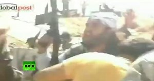 Earliest graphic video of Gaddafi capture