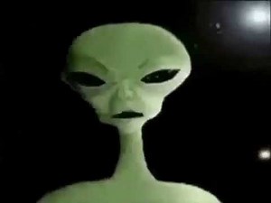 Green Alien Singing A Cruel Angel's Thesis