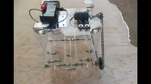 Working-Mechanism Robot Link : https://www.youtube.com/watch?v=Q0pVFdGHPGM A robot that was designed by the Java Institute for Advanced Technology is shown in the photographs. A number of various components were utilised to build this particular robot and these include perspex pieces, circuits, motor wheels, and chains. The balancing capabilities of the robot is maintained due to the presence of eight legs. | Java Institute Sri Lanka