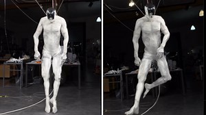 Watch creepy humanoid robot twitch and move with human-like skeleton