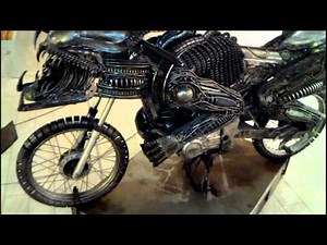 Alien on a motorcycle