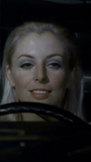 Alien mind control in a red dress