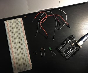Lighting Up and LED With a Switch in Arduino